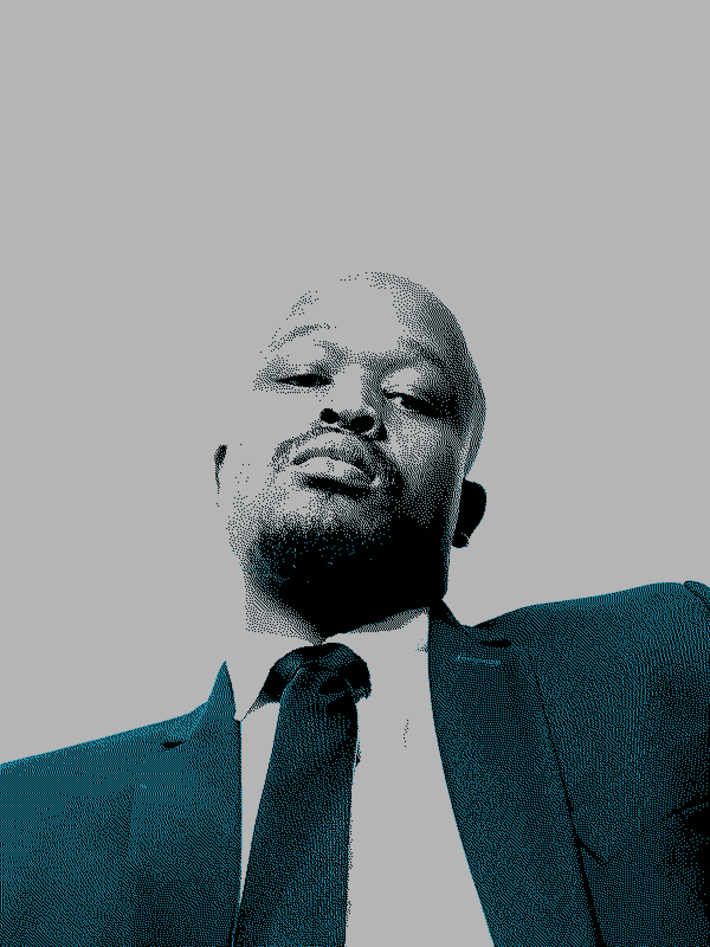 Dr P. Ntjeketsane working at a computer in the Optiact workspace